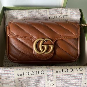 Gucci GG Marmont matelassé super mini crossbody bag